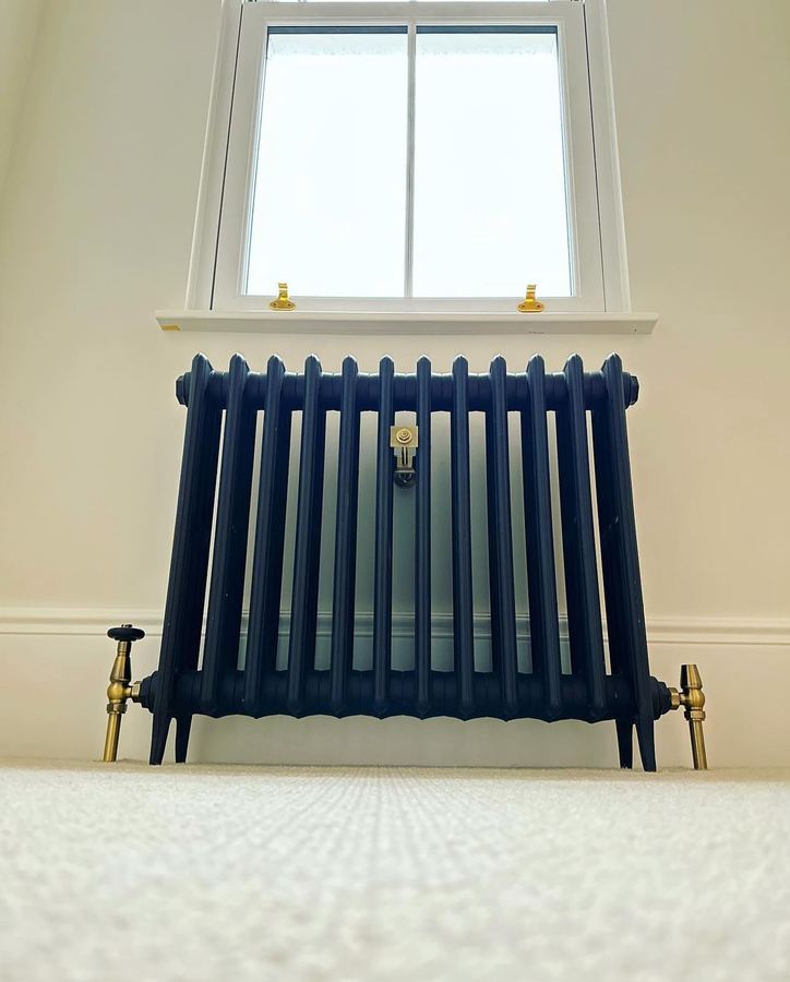 Column radiator with brass valves