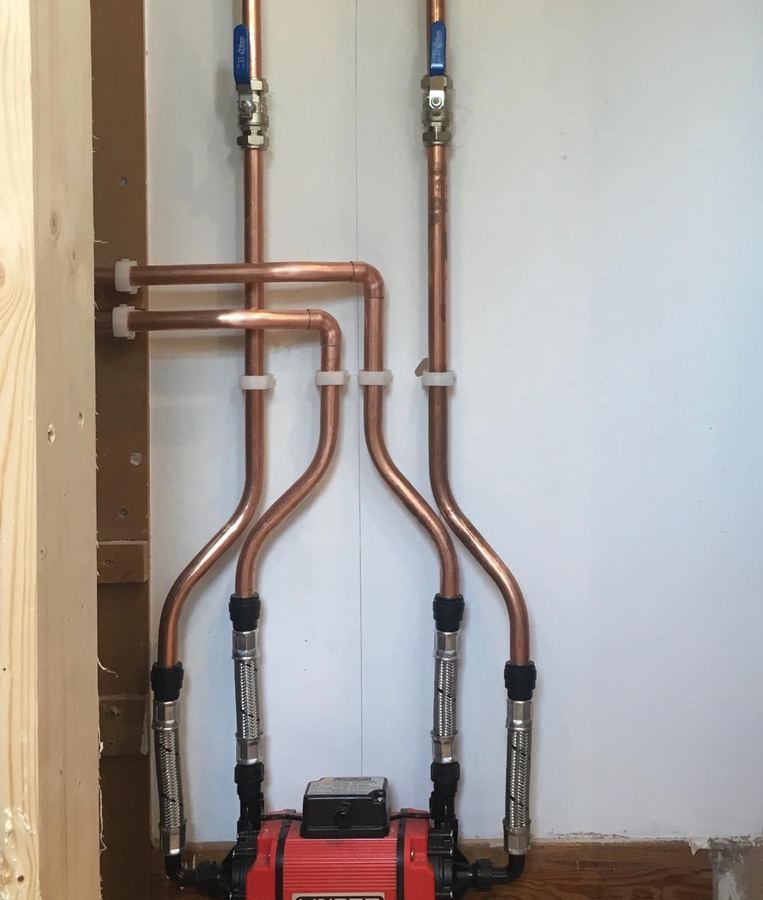 Shower pump with isolation valves