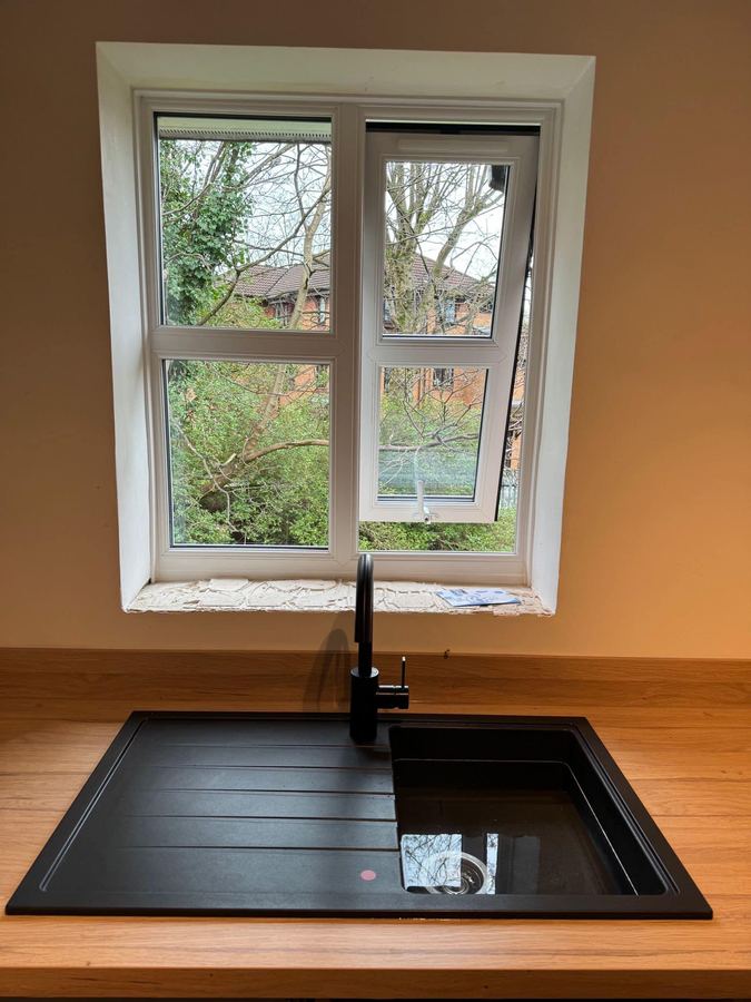 Composite sink and black mixer