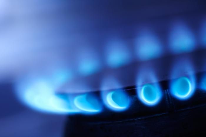Crisp blue flames on a gas hob burner
